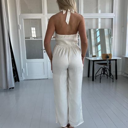 Elli – Witte en crèmekleurige satijnen jumpsuit